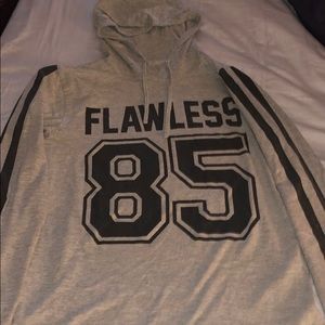 a long sleeve shirt with a hoody